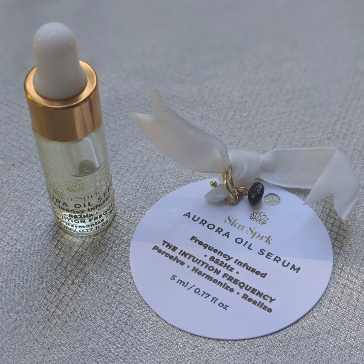 crystal on a label against a faraday cloth background